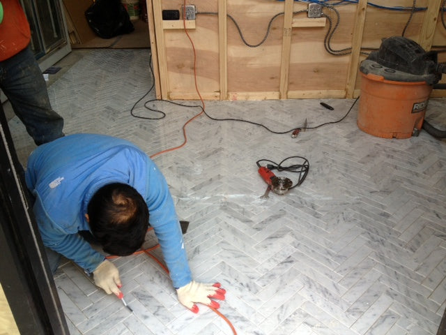 This floor was beautiful, but it needed buffing every quarter to bring back the shine. Karsch couldn’t understand how floors got dirty or how they got clean. So instead, he glued horrible fake-wood vinyl into every store. OMG.