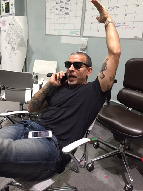 On the phone in the back room of JP11, around 2015–16. I was so self-important back then.