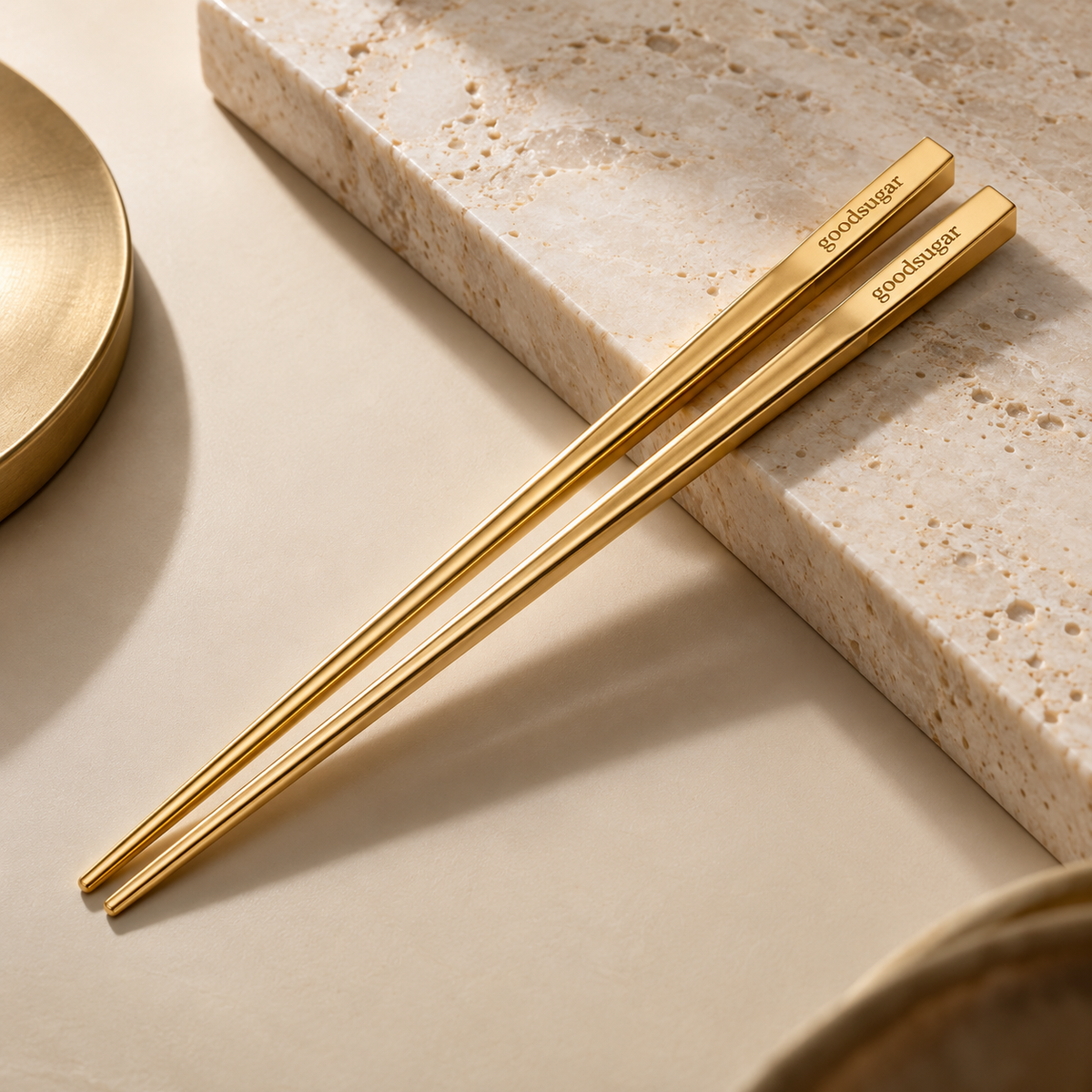 Introducing goodsugar Solid 18K Gold Chopsticks, just $3,200. Because your $14 poke bowl deserves better. Hand-forged, heavier than your conscience and impossible to drop without everyone turning around. Dishwasher safe, if your dishwasher has a security guard. Gluten-free, obviously. Pairs beautifully with brown rice, humility and a sensible credit limit. Each pair comes in a velvet box with a certificate of authenticity and a note from your accountant. Eat like royalty. Tip like it, too.