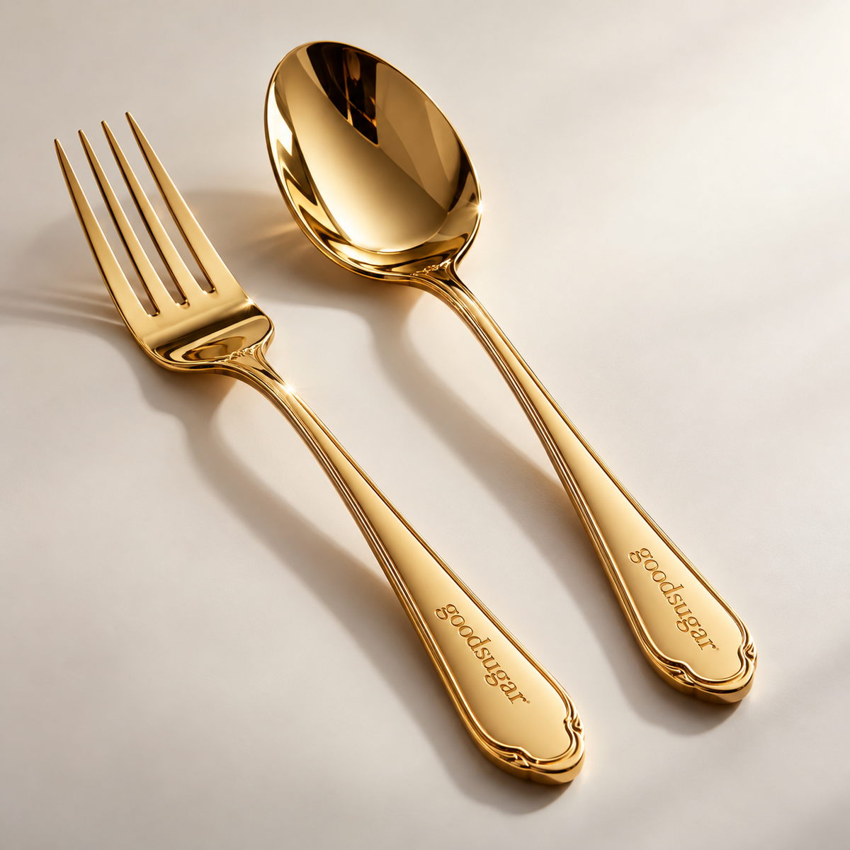 Introducing the goodsugar Solid 18K Gold Fork & Spoon Set, $4,350. Finally, cutlery as rich as our gluten-free brownies. Hand-polished, perfectly balanced and so heavy you’ll count each bite as a rep. Stirs smoothies, scoops chia pudding and silences dinner parties. Not dishwasher safe. Not roommate safe. Barely safe for you. Comes in a velvet case with a lifetime warranty and a sternly worded letter from your financial advisor. Spoon-fed luxury. Fork it over.
