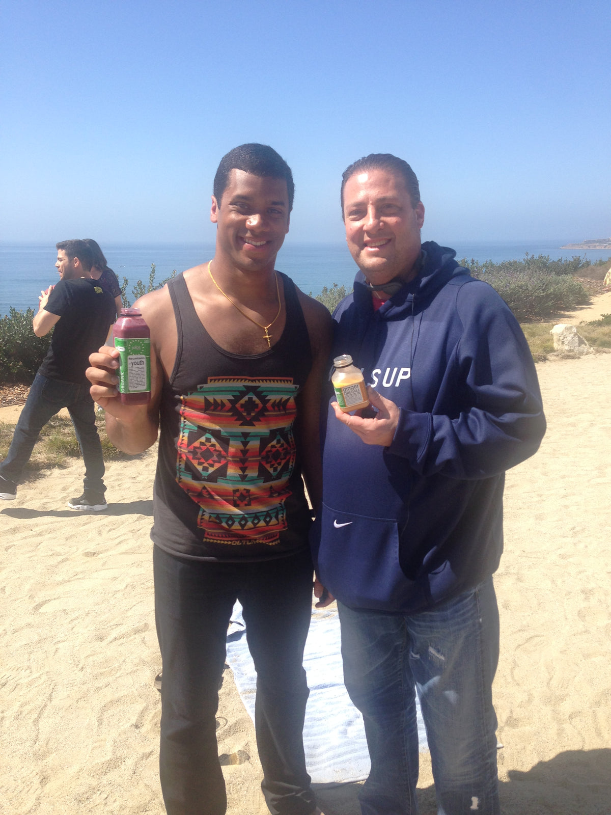 Seahawks quarterback Russell Wilson and my lead investor, Kenny Dichter, on the set of Entourage.